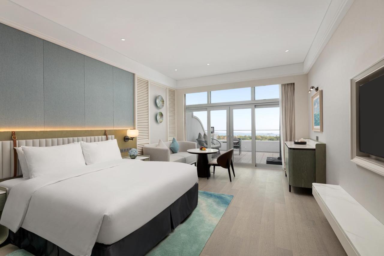 Xiamen International Seaside Hotel -Hotel Corridor Leads To The Stone Exhibition Hall Exterior photo