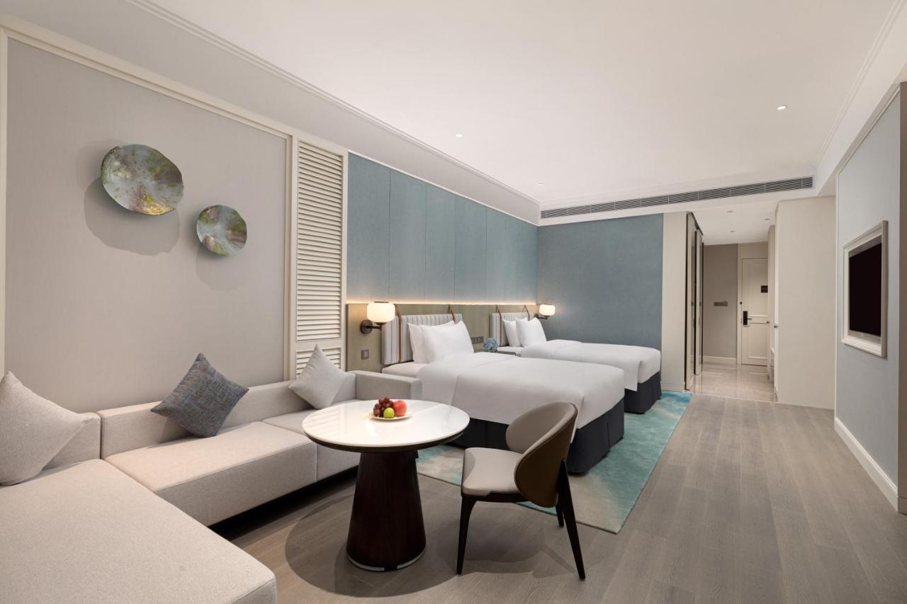 Xiamen International Seaside Hotel -Hotel Corridor Leads To The Stone Exhibition Hall Exterior photo